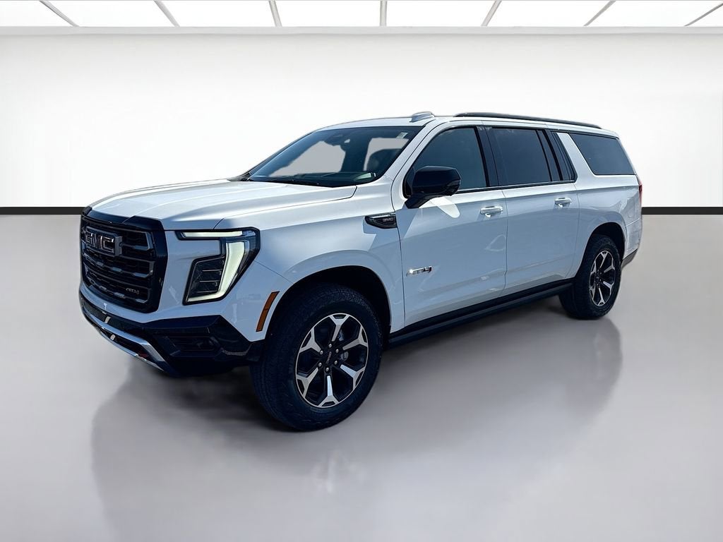 2026 GMC Yukon XL AT4 in Summit White — front three-quarter view
