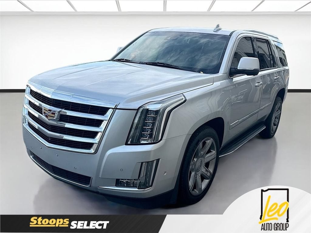 2020 Cadillac Escalade Luxury in Radiant Silver Metallic — front three-quarter view