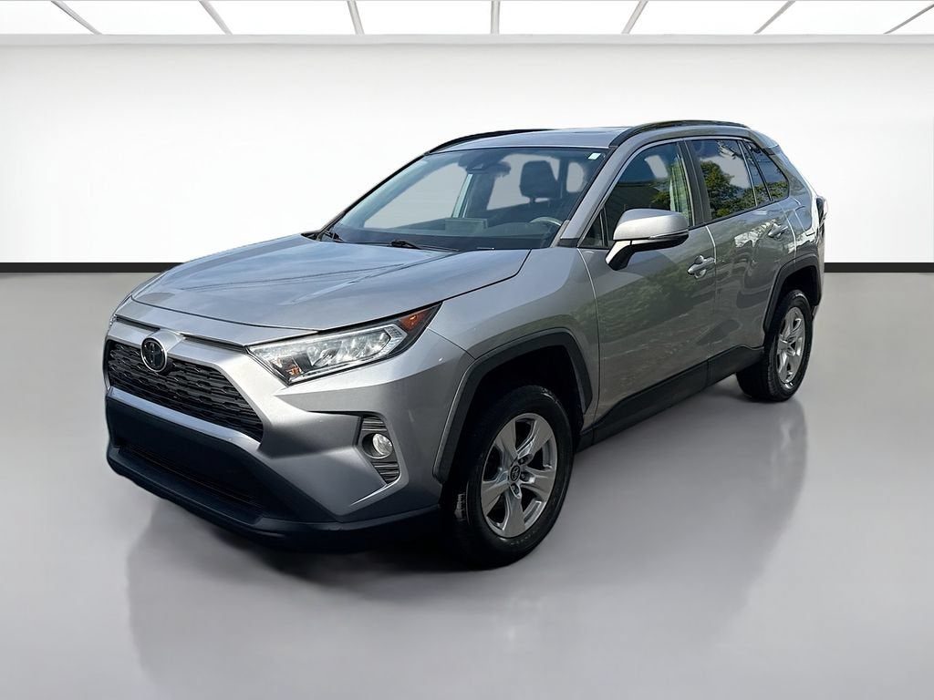 2019 Toyota RAV4 XLE in Silver — front three-quarter view