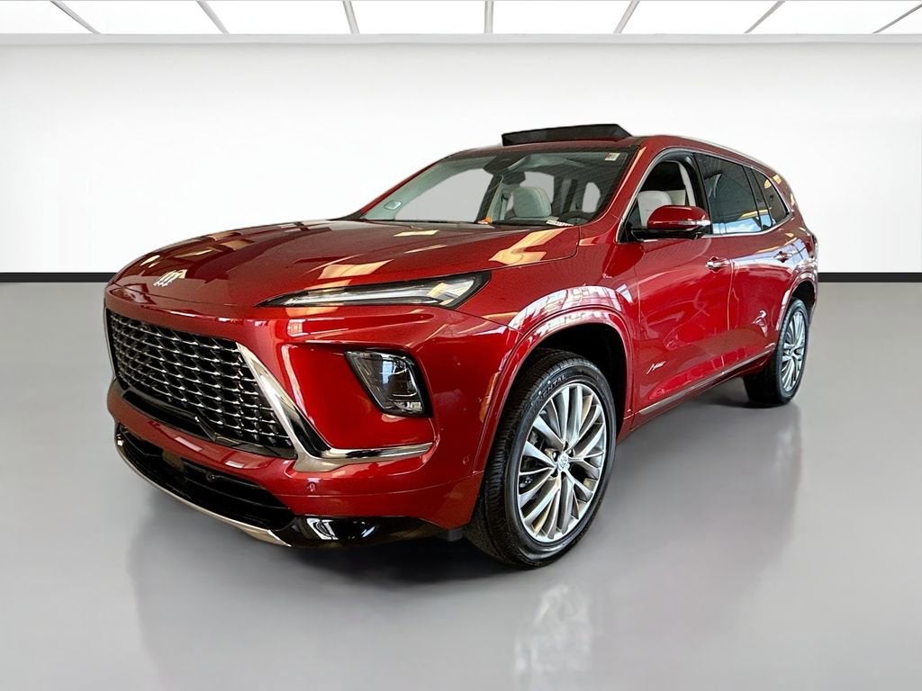 2026 Buick Enclave Avenir in Cherry Red Tintcoat — front three-quarter view