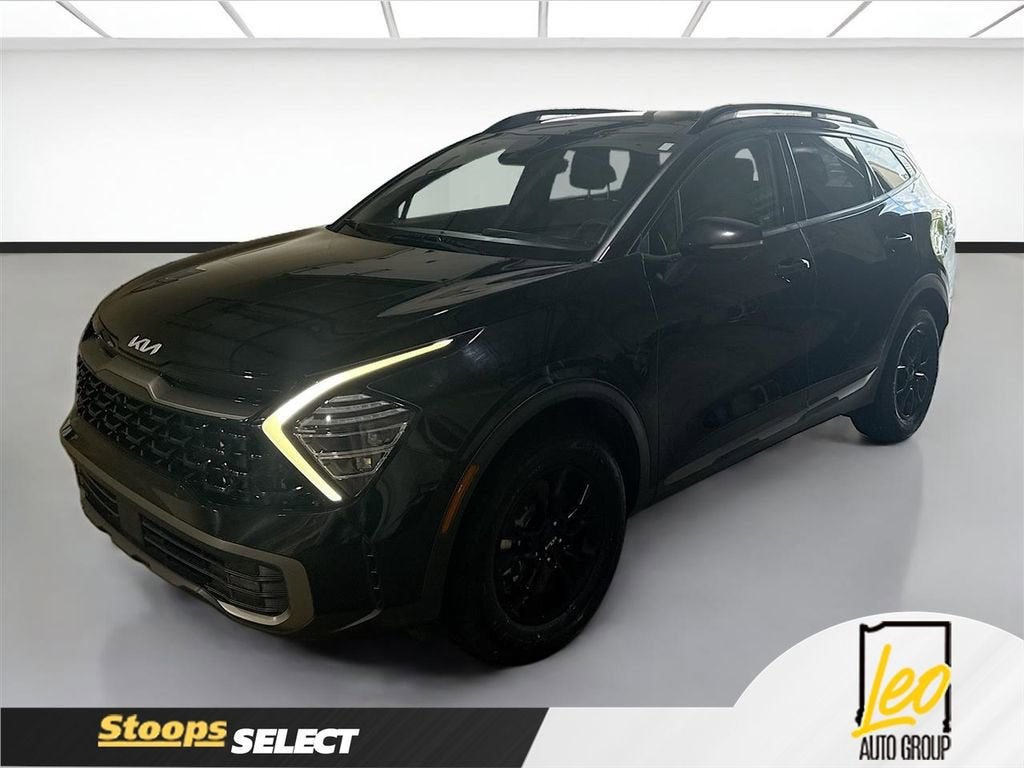 2023 Kia Sportage X-Pro Prestige in Black — front three-quarter view