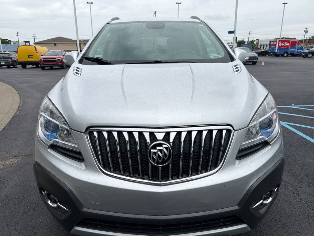 2015 Buick Encore Convenience in (Includes (Bt3) Dark Argent Metallic Lower Accent Color.) — front three-quarter view