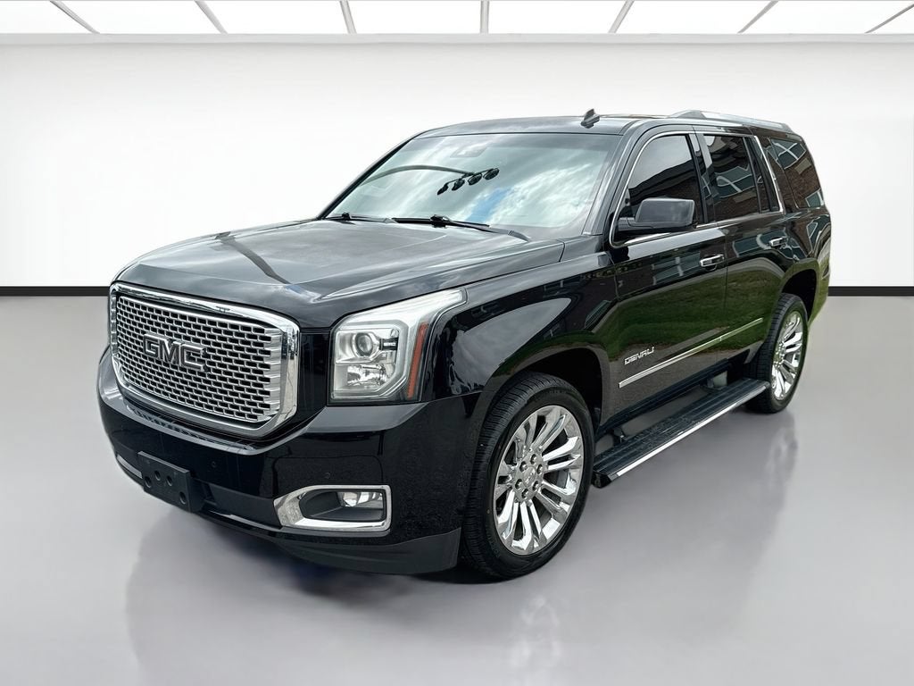 2015 GMC Yukon Denali in Black — front three-quarter view