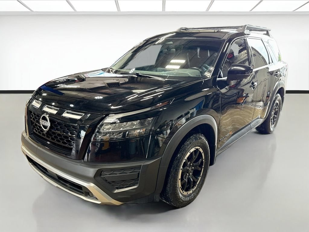2024 Nissan Pathfinder Rock Creek 4WD in Black — front three-quarter view