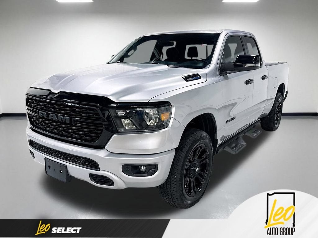 2023 RAM 1500 Big Horn Quad Cab 4x4 6'4" Box in Silver — front three-quarter view