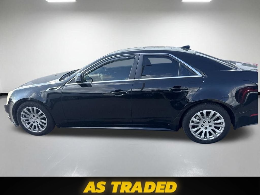 2011 Cadillac CTS Performance in Black Raven — front three-quarter view