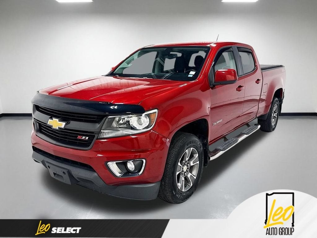 2015 Chevrolet Colorado 4WD Z71 in Red Rock Metallic — front three-quarter view