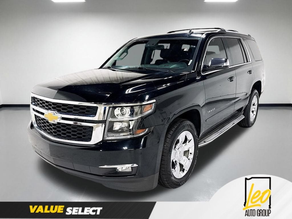 2015 Chevrolet Tahoe LTZ in Black — front three-quarter view
