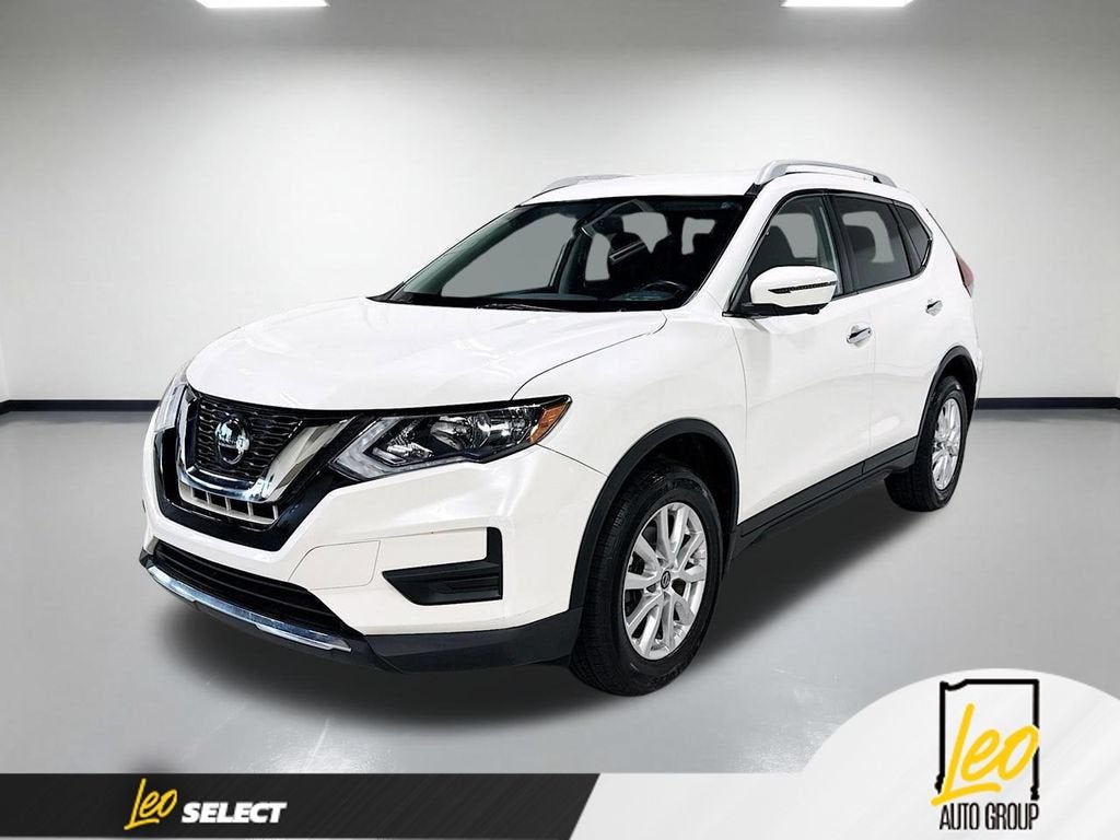 2018 Nissan Rogue SV in White — front three-quarter view